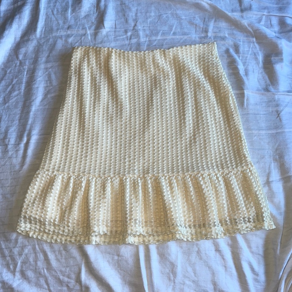 Cream patterned ruffle mini skirt